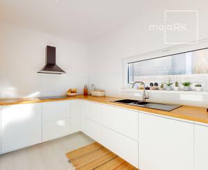 Na predaj priestranný 4-izbový dom v  Stupave